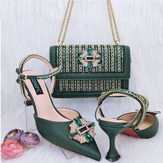 Step out in style with these stunning Nigerian Women's Pumps And Bag! With beautiful handcrafted designs, you'll look sophisticated and sophisticated for any occasion. The superior quality of the materials ensures long-lasting durability, so you can cherish the memories for years to come. Look glamorous and feel confident! Creating a dramatic, eye-catching look has never been easier. Step up your style with these stunning pumps and bag: you'll look fabulous and be sure to make a lasting impressi Designer Green Handheld Bag, Luxury Green Handheld Shoulder Bag, Designer Green Bag For Shopping, Designer Green Shopping Bag, Green Designer Bag With Detachable Strap, Luxury Green Shopping Bag, Designer Green Shoulder Bag For Shopping, Luxury Green Shoulder Bag For Shopping, Luxury Green Top Handle Shoulder Bag