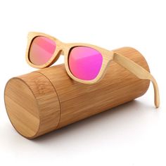 "Wooden sunglasses are perfect for eco-conscious individuals and fashion enthusiasts. They are lightweight and hypoallergenic, making them suitable for outdoor activities and those with sensitive skin. Made from sustainable bamboo. Enjoy the lightness and comfort, matched with polarized lenses for clear, protected vision. Lens width: 44mm Lens height: 34mm Lens type: UV400, polarized Wood: Bamboo Included: Sunglasses, Glasses case, Glasses cloth, Glasses bag, Polarized test card Upgrade your woo Trendy Rectangular Sunglasses For Outdoor, Summer Sunglasses With Uv Protection For Gift, Adjustable Rectangular Sunglasses With Polarized Lenses, Rectangular Polarized Sunglasses For Outdoor Activities, Rectangular Sunglasses With Uva Protection For Outdoor Activities, Rectangular Sunglasses With Uva Protection For Outdoors, Trendy Rectangular Sunglasses For Everyday Use, Rectangular Polycarbonate Sunglasses For Beach, Summer Pink Polycarbonate Sunglasses