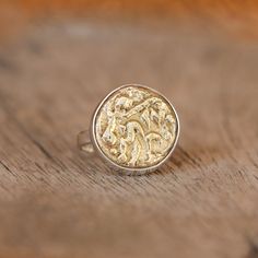 Gold Coin ring.  Old brass coin set in a simple sterling silver bezel and band. The contrast of gold and silver makes this ring so wearable and suits both men and women. It is such a sturdy and unique piece!  -  M A T E R I A L S - 925 Sterling Silver Brass - G I F T  R E A D Y - All our jewelry is neatly packaged and gift-ready. If you require multiple gift boxes, please leave us a note at checkout! - T A K I N G  C A R E  O F  Y O U R  J E W E L R Y - If you want your jewelry to become somethi Gold Etched Sterling Silver Rings, Gold Sterling Silver Rings With Etched Details, Lucky Ring, Gold Coin Ring, Ancient Coin, Coin Set, Coin Ring, Gold Coin, Ancient Coins