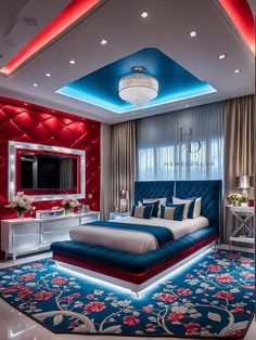 a bedroom decorated in red, white and blue with a large bed on top of a rug