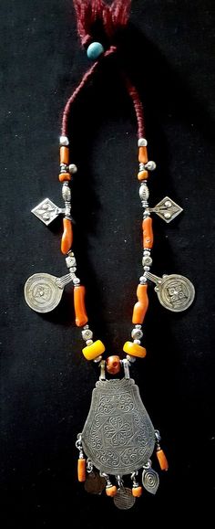 Morocco - Beautiful silver berber necklace made of genuine coral and amber beads | eBay Amber Pendant Necklace With Polished Beads, Orange Beaded Amulet Necklace, Orange Amulet Necklace With Large Beads, Bohemian Silver Beaded Necklaces With Carnelian, Bohemian Amber Jewelry With Silver Beads, Silver Carnelian Jewelry With Gemstone Beads, Unique Sterling Silver Necklaces With Large Beads, Unique Sterling Silver Necklace With Large Beads, Orange Sterling Silver Jewelry With Round Beads