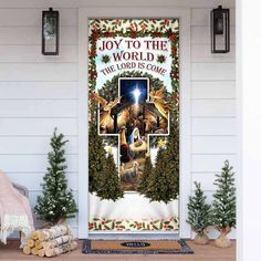 a christmas door cover with the words joy to the world and an image of jesus on it