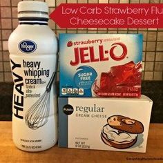 a bottle of jello next to some other items on a wooden table with the words low carb strawberry fluff cheesecake dessert