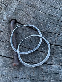 These hoops are PERFECTLY rustic like a set of modern day artifacts. They compliment an style, be it BOHO, minimalist or professional. These aren't commonplace prefab hoops because each one is crafted by hand with love but they WILL be your new favorite for everyday wear! MORE SIZES AVAILABLE HERE: https://www.etsy.com/listing/772693798/large-sterling-silver-hoop-earrings-in?ref=shop_home_active_1&pro=1&frs=1 All jewelry from my studio is endowed with a lifetime craftsmanship guarantee & Oxidized Circle Hoop Earrings As Gift, Gift Oxidized Finish Small Hoop Earrings, Small Metal Hoop Earrings With Soldered Detail, Small Hoop Metal Earrings With Soldered Details, Adjustable Soldered Hoop Earrings For Gifts, Gift Circle Hoop Earrings With Oxidized Finish, Adjustable Oxidized Finish Hoop Earrings, Adjustable Oxidized Hoop Earrings, Adjustable Small Hoop Earrings With Oxidized Finish