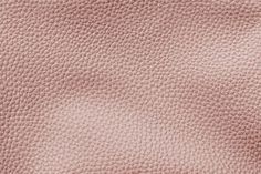 the texture of pink leather as a background