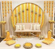 a living room decorated in yellow and white