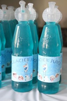 several bottles of water with labels on them are shown in an instagramting post