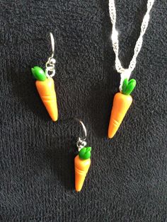 (14,017) Carrot Necklace or Earrings  Polymer Clay, about 1" x 1/4" Earrings on silver plate ear wires  Necklace on 18" sterling silver chain Sterling Silver Hypoallergenic Pendant Earrings, Sterling Silver Pierced Round Pendant Jewelry, Orange Sterling Silver Round Pendant Jewelry, Cadmium-free Sterling Silver Round Pendant Jewelry, Sterling Silver Necklace With Matching Earrings As Gift, Cadmium-free Sterling Silver Round Pendant, Orange Earring Jewelry Gift, Orange Hypoallergenic Sterling Silver Jewelry, Hypoallergenic Orange Sterling Silver Jewelry