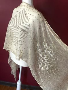 "This 1920's Egyptian wedding shawl is simply delightful. It is super soft, so sensual...the way it drapes and looks on the body is simply stunning. The silver is bright with nine filled diamonds, three large ones, and the center is filled with beautiful trees. It also has chevron borders and long rows of vines on each end. Coming in at 82 inches long and 22 wide, perfect for wearing! NO HOLES or tears, excellent condition with a small mark (pictured) This amazing piece of wearable art is 100 ye Fitted Silver Sheer Dupatta, Silk Fitted Shawl For Parties, Fitted Silk Shawl For Party, Fitted Shawl For Party And Festive Occasions, Elegant Fitted Silver Dupatta, Vintage Fitted Shawl For Wedding, Fitted Vintage Shawl For Wedding, Elegant Party Shawl With Dupatta, Fitted Elegant Shawl For Festive Occasions