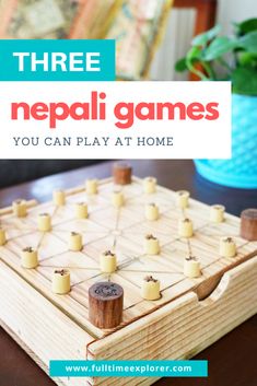 a wooden board game with candles on it and the words three nepal games you can play at home