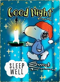 a cartoon dog holding a lit candle on top of a blue sign that says good night