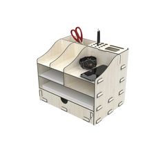 a desk organizer with scissors and a remote control in it's holder, on a white background