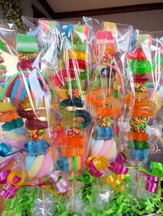 many colorful candies are wrapped in plastic bags