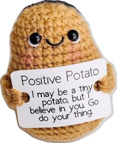 a stuffed potato holding a sign that says positive potato i may be tiny, but believe in you go do your thing