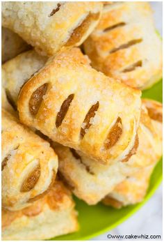 small pastries are stacked on a green plate