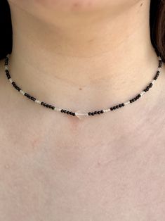 Delicate dainty choker necklace made of Black Spinel and Green Prehnite with a vintage moonstone statement bead. Hand made! Features:  - 2.5mm Black Spinel faceted beads - 2mm light green Prehnite faceted beads - Vintage Moonstone center / statement bead - sterling silver crimps, clasp, and jump ring Minimalist Faceted Beads Choker For Gift, Dainty Crystal Gemstone Beads Choker Necklace, Dainty Gemstone Beads Crystal Choker Necklace, Minimalist Faceted Round Beaded Necklaces, Minimalist Choker With Faceted Round Beads, Minimalist Choker With Round Faceted Beads, Minimalist Adjustable Faceted Crystal Necklace, Dainty Choker Necklace, Dainty Choker