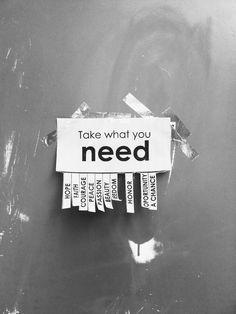 a sign that says take what you need on it