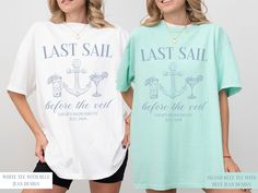 two women wearing t - shirts that say last sail and before the veil, standing next to each other