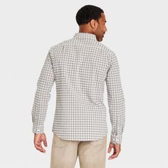 Maintain a refined look whether you're at the office or after-work hangouts by wearing this Long-Sleeve Button-Down Shirt from Goodfellow & Co™. Fashioned in a casual fit, the long-sleeve shirt made from soft cotton fabric offers cool and comfortable all-day wear. It's finished with a collared neckline, full-length button-down placket, chest patch pockets, back yoke and long sleeves with buttoned cuffs for a sleek look. Wear it with chinos, jeans or trousers for versatile styling. Goodfellow & C Casual Dress Shirt With Relaxed Fit For Office, Fall Business Casual Button-up Dress Shirt, Fall Button-up Dress Shirt For Business Casual, Casual Dress Shirt For Office In Fall, Casual Fall Dress Shirt For Office, Casual Dress Shirt With Spread Collar For Office, Casual Button-up Dress Shirt For Office, Fabric Tape, Casual Fit