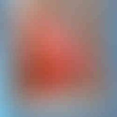 blurry image of an orange and blue background