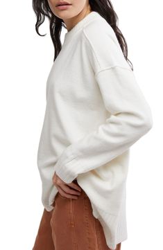 Dropped shoulders lend to a slouchy fit on this woolly longline sweater anchored by ribbed trim. Crewneck Long sleeves Ribbed cuffs and hem Side slits 51% nylon, 37% acrylic, 6% wool, 6% elastane Hand wash, dry flat Imported Longline Sweater, High Low Tunic, Sweater White, Tunic Sweater, Oversized Sweater, Layered Look, Staple Pieces, Long A Line, Soft Knits