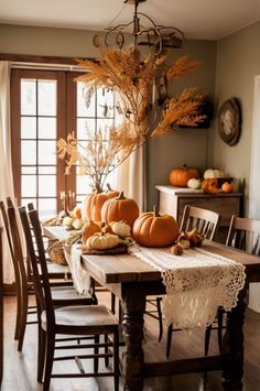 Embrace the warmth of autumn with English vintage-inspired decor. Create a cozy ambiance in your dining rooms with rich textures, antique accents, and warm colors. Discover timeless pieces that bring the beauty of fall indoors. 🍁   #VintageDecor #FallVibes #CozyHome #AutumnDecor #EnglishStyle Cozy Vintage Dining Room, Fall Interior Decor, Fall Dining Room Decor, Fall Dining Table Decor, Primitive Dining Room, Fall Dining Table, Vintage Fall Decor, Fall Dining Room, Dining Room Console