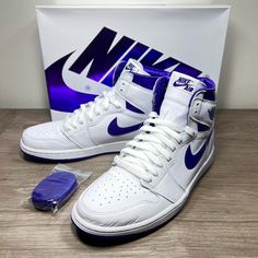 These Air Jordan 1 Retro High Court White Sneakers In Women's Size 10.5, Have A Sleek Design Featuring A White Tumbled Leather And Court Purple Patent Leather Upper With Satin Accents. The High-Top Silhouette And Lace-Up Closure Provide A Secure And Comfortable Fit, While The Rubber Outsole Offers Traction For Any Activity, Whether It Be Casual Wear Or Basketball. These Shoes Are Part Of The Air Jordan Product Line And Are Perfect For Those Who Appreciate Retro Style And High-Quality Athletic Fo Jordan 1 High Og, High Court, Air Jordan 1 Retro High Og, Air Jordan 1 Retro High, Air Jordan 1 High, Jordan 1 High, Air Jordan 1 Retro, Jordan 1 Retro High, Jordan 1 Retro