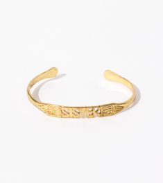 Our exclusive Bali Word Bracelets are perfect for gifting yourself or others. Wear a daily reminder to love more, find joy in the small details, respect everyone, or be a ray of sunshine. Zodiac signs also available! Brass cuff bracelet with variety of statement sayings Adjustable to fit a variety of wrist sizes Hand crafted in Bali from recycled Brass Exclusive to Cleobella Adjustable Spiritual Cuff Bracelet For Friendship, Trendy Adjustable Bangle For Friendship, Spiritual Friendship Cuff Bangle Bracelet, Stackable Bangle Friendship Bracelets As Gift, Spiritual Friendship Cuff Bracelet, Gift Stackable Bangle Friendship Bracelets, Adjustable Meaningful Name Bracelet For Best Friend, Adjustable Personalized Cuff Bracelet For Everyday, Symbolic Personalized Bracelets