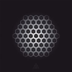 a black and white poster with hexagons in the center on a dark background