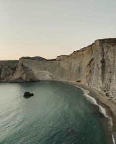 an aerial view of the beach and cliffs