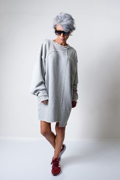 "*Extra Long Sleeves *Oversized Fit *Dropped Shoulder *Please, have in mind that there are elements in the garment that are not hemmed, on purpose! *Model is 1.64cm (5ft 3\") tall, 50 kg (110Lbs) and wears size Small SIZE CHART SIZE XS US/Canada 2 UK 4 Europe 32 Australia 6 Japan 5 Bust: around 33 in/84 cm Waist: around 26 in/66 cm Hip: around 35.5 in/90 cm Approx height: 5'7\"/170 cm SIZE S US/Canada 4/6 UK 6/8 Europe 34/36 Australia 8/10 Japan 7/9 Bust: around 35 in/88 cm Waist: around 28 in/7 Oversized Top With Asymmetrical Hem For Daywear, Oversized Grey Sweater, Stocking Fillers For Her, Extra Long Sleeves, Glamorous Style, Sweater Grey, Locker Room, Loose Sweater, Cozy Fashion