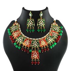 This is a stunning handmade necklace perfect for high end Jewelry Collector, a keeper in Traditional Vintage Indian/Pakistani Bridal jewelry and a Luxury Gift for your Daughter, Sister or Wife on Wedding or Anniversary. Perfect for any type of occasions, weddings And celebrations and a beautiful & memorable gift for weddings and special occasions. -Item Code:- L2260 -Polki Diamond Necklace Set with Earrings. -Designer Meenakari Polki Diamond Necklace Set. -Gold Plated Set with Kundan Stones which shine like Polki Diamonds. -Metal: Gold plated brass -Necklace Size: Adjustable with dori cord  -Earrings are 68mm long & 25mm wide approx -Push Back Earrings -Quantity:- One Necklace Set Please see more different designs here:- https://www.etsy.com/in-en/shop/LUCKYJEWELSART?ref=seller-platform-mc Polki Diamond Necklace, Pakistani Bridal Jewelry, Necklace Set With Earrings, High End Jewelry, Diamond Necklace Set, Kundan Necklace, Kundan Necklaces, Brass Necklace, Bridesmaid Necklace