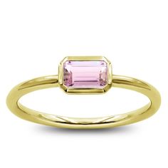 This bezel set ring with a pink 0.35ct tourmaline center stone is the perfect ring to stack with other fashion rings. Pink Stackable Rings For Formal Occasions, Elegant Pink Sapphire Ring With Bezel Setting, Formal Pink Stackable Rings Fine Jewelry, Classic Pink Rings With Bezel Setting, Elegant Tourmaline Birthstone Ring With Bezel Setting, Classic Pink Bezel Set Ring, Pink Sapphire Ring With Bezel Setting For Promise, Elegant Pink Sapphire Stackable Ring, Modern Pink Gemstone Rings