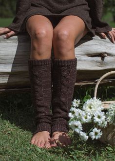 Introducing the Paloma Leg Warmers, a fun and stylish accessory for your seasonal wardrobe. Hand-crafted with a centre cable knit, these leg warmers add a playful, wintery look to any outfit. The soft top elastic ensures they stay in place all day long, providing both style and comfort. Made from 100% natural fibres, these leg warmers are designed in one size to fit most. Available in Vanilla and Coffee, they are perfect for complementing mini skirts or shorts on chilly days. Fun and stylish leg warmers Hand-crafted with a centre cable knit Soft top elastic to keep them in place Made from 100% natural yarns Available in Vanilla and Coffee One size fits most