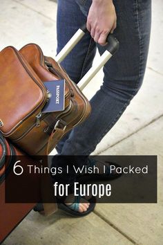 a woman holding two pieces of luggage with the words, 6 things i wish i packed for europe