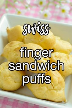 this is an image of finger sandwhich puffs on a white plate