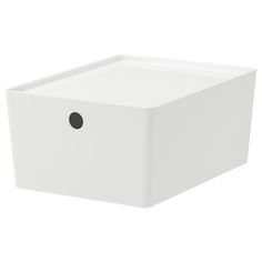 a white square box with a black dot on the front and bottom corner, sitting against a white background