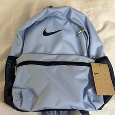 Nike Book Bag. Durable Material! Nike Backpack Blue, Blue Shoulder Bag For Back To School, Blue Student Bag, Blue Lightweight School Bag, Portable Blue Backpack, Light Blue Shoulder Bag For School, Blue Rectangular Shoulder Bag For Back To School, Blue Bags For Back To School, Back To School Blue Softback Shoulder Bag