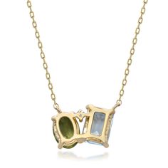 This multi-genstone necklace makes a stylish statement with luminous gemstones in an alluring layout. Crafted in glistening 10K yellow gold, this lovely necklace features one oval peridot, one emerald cut blue topaz and one brilliant cut diamond artistically set in a modern design. | Toi et Moi Multi-Gemstone Necklace | 10K Yellow Gold | Size 18" | Helzberg Diamonds Yellow Gold Multi-stone Necklace For May Birthstone, Gold Multi-stone Necklace For May Birthstone, May Birthstone Multi-stone Pendant Necklace, 14k Yellow Gold Necklace With Gemstone Accents, 14k Gold Necklace With Gemstone Accents For Anniversary, 14k Gold Necklaces With Gemstone Accents For Anniversary, Elegant Gold Multi-stone Birthstone Necklace, Yellow Gold Necklaces With Gemstone Accents For Anniversary, Yellow Gold Necklace With Gemstone Accents For Anniversary