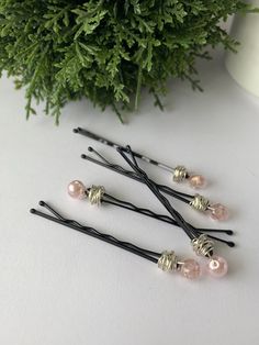 Welcome to Tabor And Lark!   This Bobby Pin set is a classic set of faux pearls and crystals in a gorgeous soft pink color.  It would make a perfect gift to give to a mother or a bride-to-be.  It would also just help with keeping your bangs out of your eyes as you grow your hair out. Either way a classic hair accessory.  🌿The set pictured is made with the Blackest Black Bobby Pins and Silver tone Wire. 🌿Dimensions- Bobby Pins are are approximately 2 inches long.  🌿The set will arrive in an or Pink Barrettes, Growing Your Hair Out, Hair Slides, Soft Pink Color, Hair Slide, Bobby Pin, Crystal Hair, Pink Pearl, Organza Bags