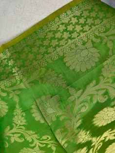 Stunning Banarasi Dupatta in Green Color with Muted Zari Weaving. Floral Design in Jaal with tassles. Give your Outfit a new look with these beauties. ❤️ Item: DupattaBase color : GreenFabric : Soft Semi Silk (Not Pure Silk)Work : Zari Weaved with tasselsLength of the Dupatta : 92 inches approx.Width of the dupatta : 35 inches (Approx.)Store Policies- No return or exchange will be accepted for color variations.- No return or exchange will be accepted if the color does not match your other clothi Green Saree With Woven Motifs For Traditional Ceremonies, Green Handloom Traditional Wear For Wedding, Green Saree With Woven Motifs, Traditional Drape, Green Chanderi Traditional Wear With Woven Motifs, Woven Motifs Dupatta For Wedding, Green Dupatta With Woven Motifs For Traditional Ceremonies, Green Dupatta With Woven Motifs For Diwali, Diwali Green Dupatta With Woven Motifs, Green Traditional Wear With Woven Motifs