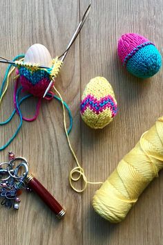 Patterned knitted Easter eggs in yellow, pink and teal.  One Easter egg is show being knitted around a wooden egg, with yarn and accessories nearby. Easy Knitting Projects, Knitting Kit, Easter Inspiration, Wooden Eggs, Knitting Kits, Easter Gifts, Easy Knitting, Easter Decor, Knitting Needles