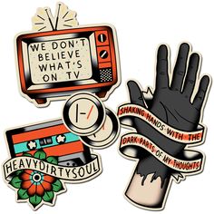 some stickers that are on the back of a cell phone and one has a hand with