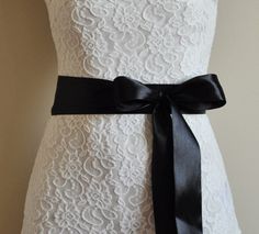 This black wedding belt will be a great addition to your halloween or evening gown. It will add some color to your wedding outfit and emphasize the waist. Will ba a great addition for you evening attire.  It is 5 cm / 1,97" wide and 3 m / 9,84 ft. / 3,28 yards long. This length is long enough to be worn tied in the back, and the tails will hang very long down the back of your gown after you tie your bow. It will also look beautiful if you wrap it around your waist twice and tie the bow in the fr Halloween Gown, Black Gothic Wedding, Wedding Sweater, Black Halloween Costumes, Evening Dress Black, Wedding Bolero, Bow Sash, Satin Belt, Bolero Wedding