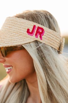 This stylish straw visor makes the perfect accessory to improve your look for any sunny outings. Personalize it with your preferred colors and monogram for a unique touch that's sure to make a statement. You'll be able to easily recognize yours among the rest! Enjoy the sunshine in style. Hat Details: Beige straw Visor 4" Brim Adjustable Velcro back Trendy Straw Visor Hat For Vacation, Spring Beach Straw Visor, Adjustable Straw Visor For Summer, Trendy Straw Visor Hat For Beach Season, Summer Straw Visor For Spring, Straw Visor For Spring And Summer, Summer Visor One Size Fits Most, Summer Straw Visor For Vacation, Spring Straw Visor With Uv Protection