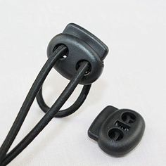 Black Double Holes Oval Bean Cord Lock Stopper Toggles Spring Adjuster Fastener Material: Plastic Size: approx. 2.4cm x 2.1cm (Hole: 0.9cm) Rope Clamp, Boat Bag, Branded Shoes For Men, Elastic Shoe Laces, Rope Cord, Elastic Rope, Genuine Leather Shoes, Black Leather Shoes, Shoe Lace