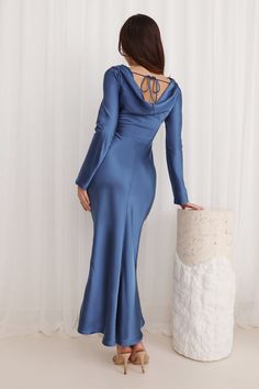 Length from shoulder to hem of size S: 135cm. 
 Chest: 40cm, Waist: 32cm, across front only of size S. 
 Maxi dress. 
 Unlined. 
 Model is a standard XS and is wearing size XS. 
 True to size. 
 Non-stretch. 
 Long sleeve. 
 Tie-up back. 
 Cowl neck/back. 
 Zipper.  
 Cold hand wash only. 
 Polyester. 
 
 Lovely, this is the classiest dress you need in your events wardrobe. The Classy Vibe Maxi Dress features a silky satin silhouette, and a cowl neck and back with a tie design. Style with heels Prom Shopping, Tie Design, Maxi Dress Navy, Maxi Dress Wedding, Shop Maxi Dresses, Classy Dress, Fashion Classy, Sequin Dress, Homecoming Dresses