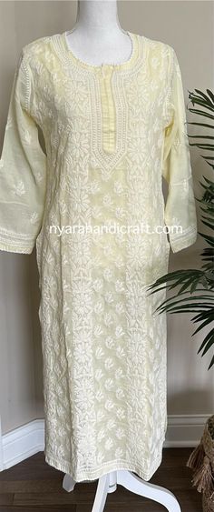 Soft cotton hand embroidered Kurta in a soft butter cream color.  Pair it with a soft cotton white pants. Sold separately. Kurta Length: 46 inches Liner included White Casual Kurta With Floral Embroidery, White Cotton Kurta With Floral Embroidery, White Cotton Sets With Chikankari Embroidery, Spring Cotton Kurta With Tonal Embroidery, Beige Chikankari Kurta For Summer, Beige Chikankari Embroidery Kurta For Summer, Summer Beige Kurta With Chikankari Embroidery, Casual White Embroidered Kurta, Casual White Kurta With Chikankari Embroidery