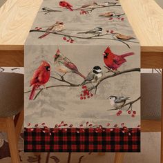 a table runner with birds on it