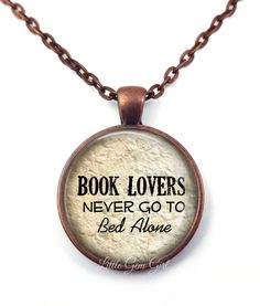 "Book Lovers Never go to Bed Alone Necklace - Reading Jewelry - Book Necklace or Key Chain - Funny Reader Gifts - Library Teacher Gift \"Book Lovers Never go to Bed Alone\" book jewelry necklace. A wonderful gift for Book Lovers, Teachers, Librarians, Literary Scholars, Writers and Authors, Book Clubs, etc! The pendant is 1 inch (25mm) in diameter. High quality vibrant colored image is fused to a thick glass bevel which gives a magnifying appearance that is truly lovely. Available in 5 setting c Reader Gifts, Jewelry Book, Book Necklace, Book Clubs, Book Jewelry, Go To Bed, Crafting Materials, Pin Image, Text On Photo